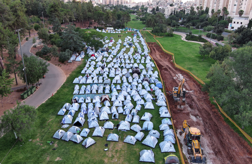 Protesters against the Israeli government's judicial overhaul plans gather in a camp they erected in Jerusalem July 23, 2023. (credit: REUTERS/ILAN ROSENBERG) Protesters against the Israeli government's judicial overhaul plans gather in a camp they erected in Jerusalem July 23, 2023. (credit: REUTERS/ILAN ROSENBERG)