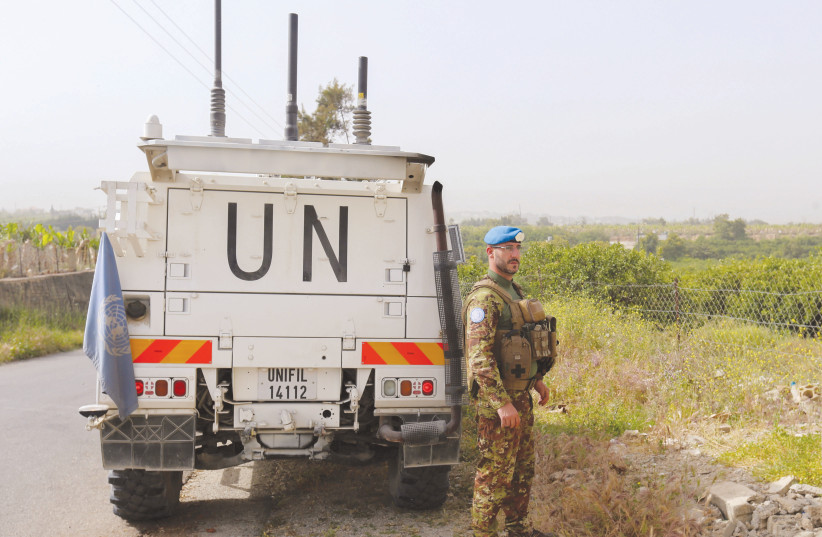 A UNIFIL peacekeeper stands next to a UN vehicle in southern Lebanon, in April (credit: AZIZ TAHER/REUTERS) A UNIFIL peacekeeper stands next to a UN vehicle in southern Lebanon, in April (credit: AZIZ TAHER/REUTERS)