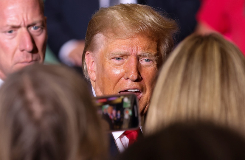 Former U.S. President and Republican presidential candidate Donald Trump speaks with people at a campaign event in Council Bluffs, Iowa, U.S., July 7, 2023. (credit: REUTERS/SCOTT MORGAN) Former U.S. President and Republican presidential candidate Donald Trump speaks with people at a campaign event in Council Bluffs, Iowa, U.S., July 7, 2023. (credit: REUTERS/SCOTT MORGAN)