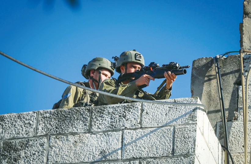 IDF SOLDIERS operate in Jenin this week. ‘They’re just doing what they have to do when they leave school; kids who have huge responsibilities, way beyond their years,’ says the writer. (credit: WISAM HASHLAMOUN/FLASH90) IDF SOLDIERS operate in Jenin this week. ‘They’re just doing what they have to do when they leave school; kids who have huge responsibilities, way beyond their years,’ says the writer. (credit: WISAM HASHLAMOUN/FLASH90)
