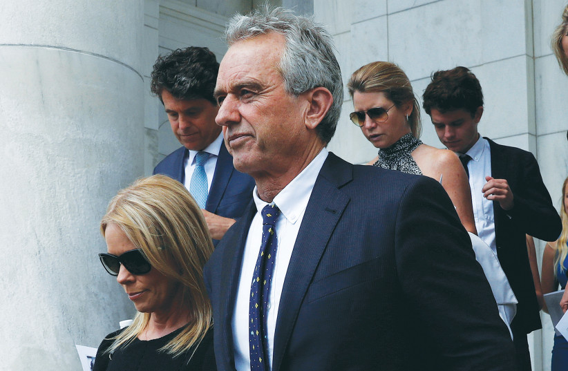 ROBERT F. KENNEDY JR. arrives with his wife, Cheryl Hines, at Arlington National Cemetery, in 2018, to mark the 50th anniversary of the death of his father, Robert F. Kennedy. (credit: LEAH MILLIS/REUTERS) ROBERT F. KENNEDY JR. arrives with his wife, Cheryl Hines, at Arlington National Cemetery, in 2018, to mark the 50th anniversary of the death of his father, Robert F. Kennedy. (credit: LEAH MILLIS/REUTERS)