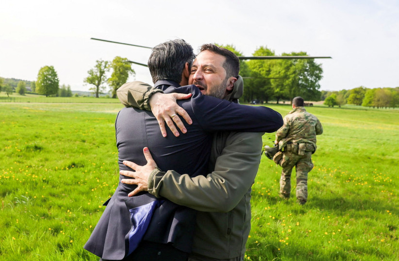 Britain's Prime Minister Rishi Sunak hugs Ukraine's President Volodymyr Zelensky in Aylesbury, Britain, May 15, 2023. (credit: Rishi Sunak via Twitter/Handout via REUTERS) Britain's Prime Minister Rishi Sunak hugs Ukraine's President Volodymyr Zelensky in Aylesbury, Britain, May 15, 2023. (credit: Rishi Sunak via Twitter/Handout via REUTERS)