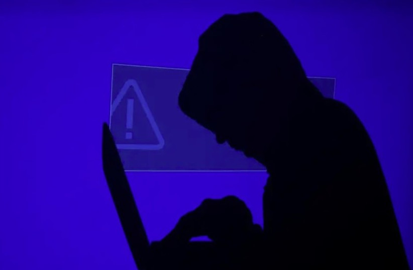 A hacker is being depicted in this illustrative photo (credit: Courtesy) A hacker is being depicted in this illustrative photo (credit: Courtesy)