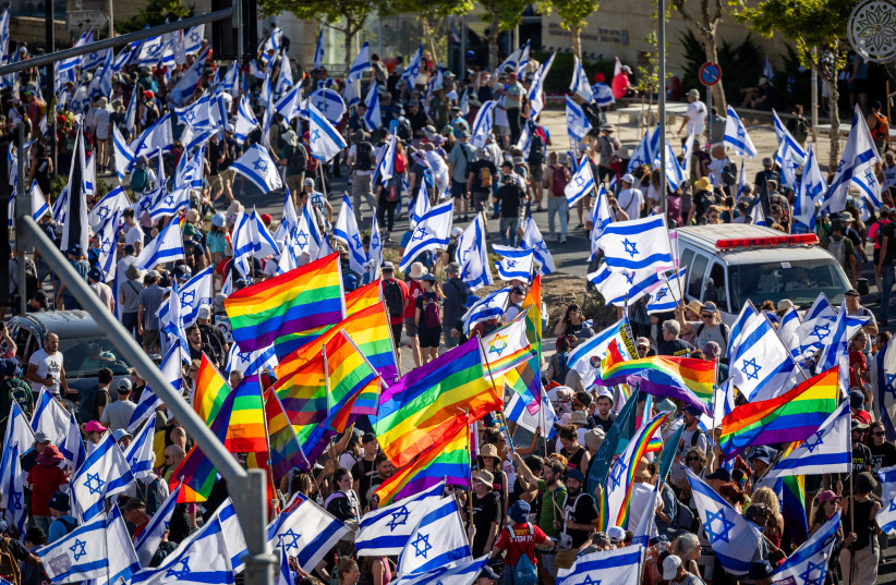 Anti-overhaul activists protest near the Supreme Court in Jerusalem, during a protest against the government's judicial overhaul, on July 23, 2023 (credit: YONATAN SINDEL/FLASH90) Anti-overhaul activists protest near the Supreme Court in Jerusalem, during a protest against the government's judicial overhaul, on July 23, 2023 (credit: YONATAN SINDEL/FLASH90)