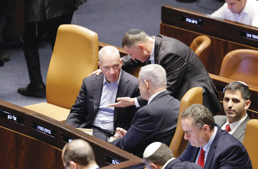 YULI EDELSTEIN talks to Defense Minister Yoav Gallant as Prime Minister Benjamin Netanyahu looks on during the Knesset vote on the reasonableness standard last week. (credit: MARC ISRAEL SELLEM/THE JERUSALEM POST) YULI EDELSTEIN talks to Defense Minister Yoav Gallant as Prime Minister Benjamin Netanyahu looks on during the Knesset vote on the reasonableness standard last week. (credit: MARC ISRAEL SELLEM/THE JERUSALEM POST)