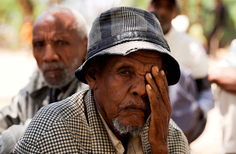 People displaced due to the fighting between the Tigray People's Liberation Front (TPLF) forces and Ethiopian National Defence Force (ENDF) allied with Amhara Special Forces, rest outside their shelter at the Abi Adi camp for the Internally Displaced Persons in Abi Adi, Tigray Region, Ethiopia. (credit: REUTERS/Tiksa Negeri/File Photo) People displaced due to the fighting between the Tigray People's Liberation Front (TPLF) forces and Ethiopian National Defence Force (ENDF) allied with Amhara Special Forces, rest outside their shelter at the Abi Adi camp for the Internally Displaced Persons in Abi Adi, Tigray Region, Ethiopia. (credit: REUTERS/Tiksa Negeri/File Photo)