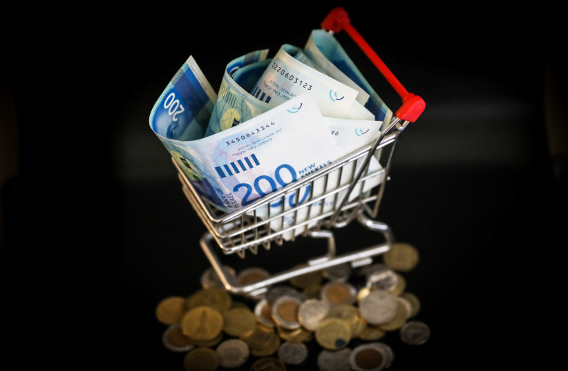 Illustrative photo of Israeli money (credit: MARC ISRAEL SELLEM) Illustrative photo of Israeli money (credit: MARC ISRAEL SELLEM)