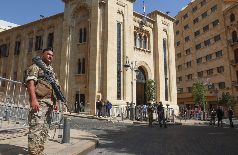 A member of the Lebanese army stands guard as Lebanon's parliament is set to convene in a bid to elect a head of state to fill the vacant presidency, in downtown Beirut, Lebanon June 14, 2023. (credit: REUTERS/MOHAMED AZAKIR) A member of the Lebanese army stands guard as Lebanon's parliament is set to convene in a bid to elect a head of state to fill the vacant presidency, in downtown Beirut, Lebanon June 14, 2023. (credit: REUTERS/MOHAMED AZAKIR)