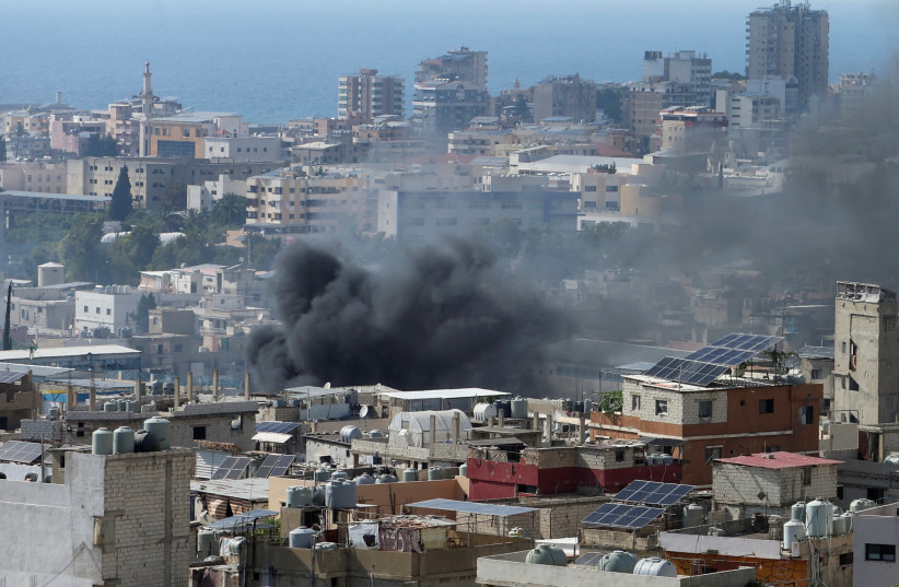 Smoke rises from Ain el-Hilweh Palestinian refugee camp during Palestinian faction clashes, in Sidon, Lebanon July 30, 2023 (credit: AZIZ TAHER/REUTERS) Smoke rises from Ain el-Hilweh Palestinian refugee camp during Palestinian faction clashes, in Sidon, Lebanon July 30, 2023 (credit: AZIZ TAHER/REUTERS)