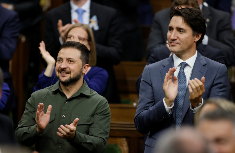 Canadian Prime Minister Justin Trudeau and Ukraine's President Volodymyr Zelenskiy react following his speech at the House of Commons on Parliament Hill in Ottawa, Ontario, Canada September 22, 2023. (credit: REUTERS/Blair Gable/Pool) Canadian Prime Minister Justin Trudeau and Ukraine's President Volodymyr Zelenskiy react following his speech at the House of Commons on Parliament Hill in Ottawa, Ontario, Canada September 22, 2023. (credit: REUTERS/Blair Gable/Pool)