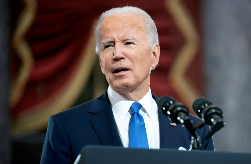 US President Joe Biden delivers remarks in the Statuary Hall of the US Capitol during a ceremony on the first anniversary of the January 6, 2021 attack on the US Capitol by supporters of former President Donald Trump in Washington, D.C., US, January 6, 2022. (credit: GREG NASH/POOL VIA REUTERS) US President Joe Biden delivers remarks in the Statuary Hall of the US Capitol during a ceremony on the first anniversary of the January 6, 2021 attack on the US Capitol by supporters of former President Donald Trump in Washington, D.C., US, January 6, 2022. (credit: GREG NASH/POOL VIA REUTERS)