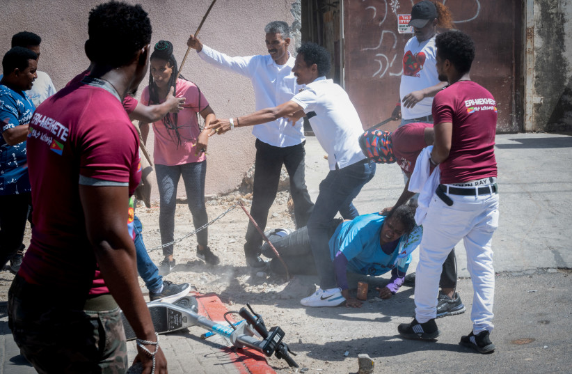 Eritrean asylum seekers who oppose the regime in Eritrea and pro regime activists clash with Israeli police in south Tel Aviv, September 2, 2023. (credit: Omer Fichman/Flash90) Eritrean asylum seekers who oppose the regime in Eritrea and pro regime activists clash with Israeli police in south Tel Aviv, September 2, 2023. (credit: Omer Fichman/Flash90)
