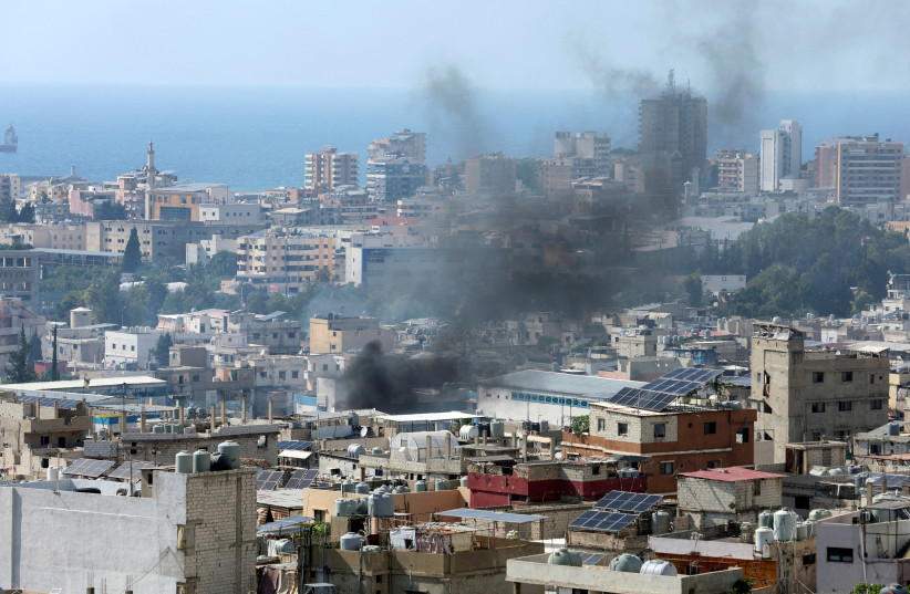 Smoke rises from Ain el-Hilweh Palestinian refugee camp during a previous round of Palestinian factional clashes, in Sidon, Lebanon, July 30, 2023. (credit: REUTERS/AZIZ TAHER) Smoke rises from Ain el-Hilweh Palestinian refugee camp during a previous round of Palestinian factional clashes, in Sidon, Lebanon, July 30, 2023. (credit: REUTERS/AZIZ TAHER)