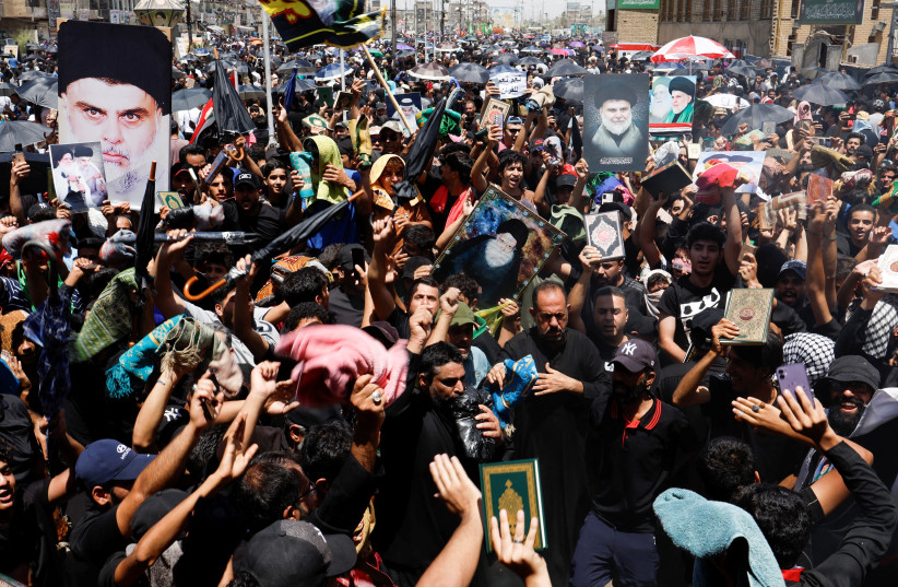 Supporters of Iraqi Shi'ite cleric Muqtada al-Sadr take part in a protest after the embassy was stormed and set on fire ahead of an expected Koran burning in Stockholm, in Baghdad, Iraq July 21, 2023. (credit: REUTERS/ALAA AL-MARJANI) Supporters of Iraqi Shi'ite cleric Muqtada al-Sadr take part in a protest after the embassy was stormed and set on fire ahead of an expected Koran burning in Stockholm, in Baghdad, Iraq July 21, 2023. (credit: REUTERS/ALAA AL-MARJANI)
