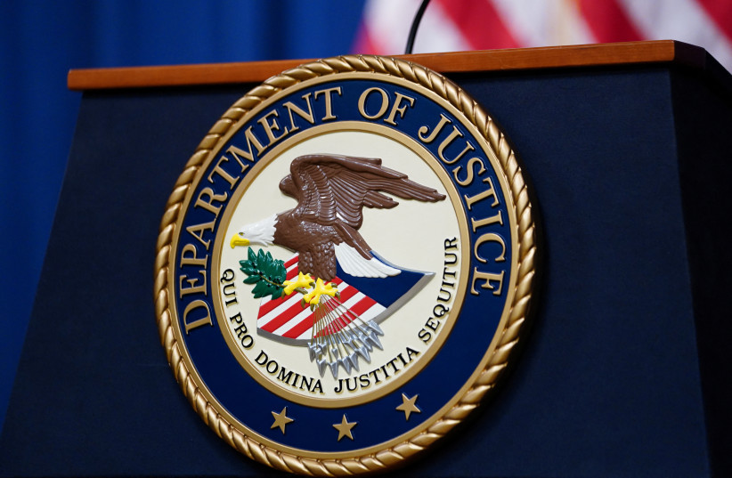 The seal of the US Justice Department is seen on the podium in the Department's headquarters briefing room before a news conference with the Attorney General in Washington, January 24, 2023. (credit: REUTERS/KEVIN LAMARQUE) The seal of the US Justice Department is seen on the podium in the Department's headquarters briefing room before a news conference with the Attorney General in Washington, January 24, 2023. (credit: REUTERS/KEVIN LAMARQUE)