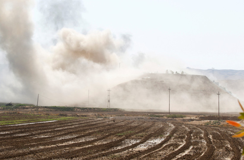 Smoke rises from the Iraqi Kurdistan headquarters of the Kurdistan Freedom Party (PAK), after Iran's Revolutionary Guards' strike on the outskirts of Kirkuk, Iraq September 28, 2022. (credit: AKO RASHEED/REUTERS) Smoke rises from the Iraqi Kurdistan headquarters of the Kurdistan Freedom Party (PAK), after Iran's Revolutionary Guards' strike on the outskirts of Kirkuk, Iraq September 28, 2022. (credit: AKO RASHEED/REUTERS)