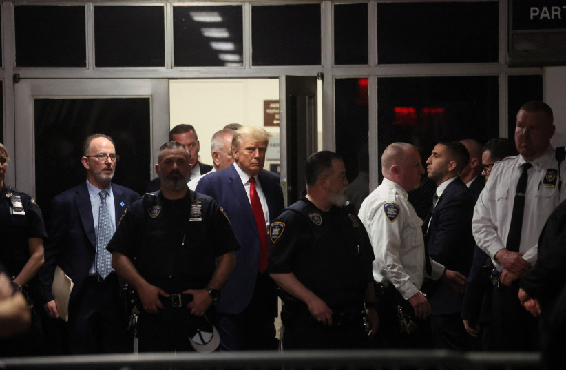 Former U.S. President Donald Trump arrives at Manhattan Criminal Courthouse, after his indictment by a Manhattan grand jury following a probe into hush money paid to porn star Stormy Daniels, in New York City, U.S., April 4, 2023. (credit: BRENDAN MCDERMID/REUTERS) Former U.S. President Donald Trump arrives at Manhattan Criminal Courthouse, after his indictment by a Manhattan grand jury following a probe into hush money paid to porn star Stormy Daniels, in New York City, U.S., April 4, 2023. (credit: BRENDAN MCDERMID/REUTERS)