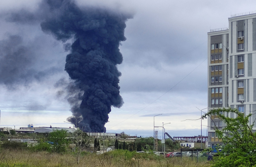 Smoke rises over a fuel tank following an alleged drone attack in Sevastopol, Crimea, April 29, 2023. (credit: STRINGER/ REUTERS) Smoke rises over a fuel tank following an alleged drone attack in Sevastopol, Crimea, April 29, 2023. (credit: STRINGER/ REUTERS)