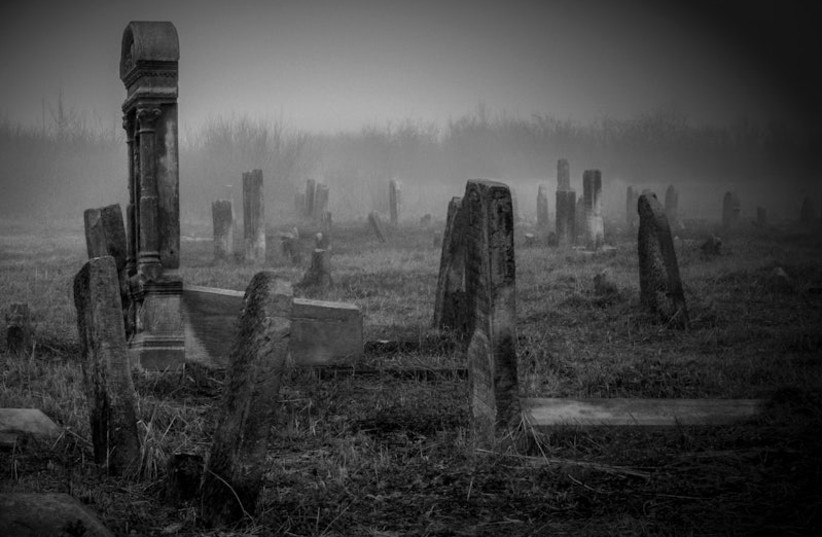 A black and white photo of an old cemetery. (credit: RAWPIXEL) A black and white photo of an old cemetery. (credit: RAWPIXEL)