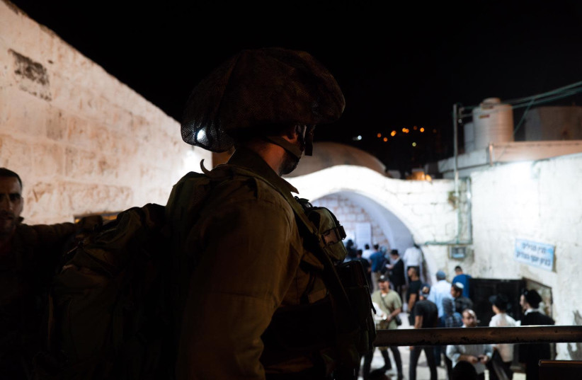 IDF forces secure Joseph's Tomb before 1,200 worshippers arrive on July 29, 2019 (credit: IDF SPOKESPERSON'S UNIT) IDF forces secure Joseph's Tomb before 1,200 worshippers arrive on July 29, 2019 (credit: IDF SPOKESPERSON'S UNIT)