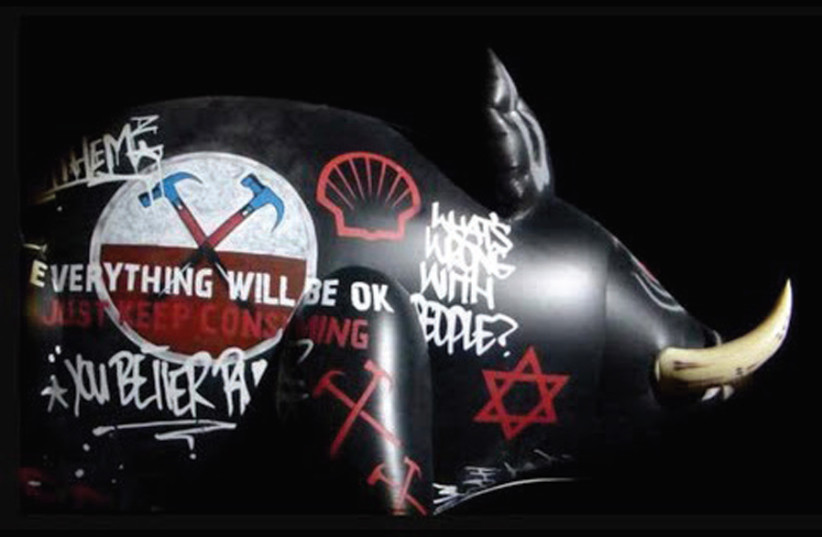 An inflatable pig with a Star of David painted on it was displayed during a Roger Waters performance of The Wall in Belgium in 2013 (credit: Courtesy) An inflatable pig with a Star of David painted on it was displayed during a Roger Waters performance of The Wall in Belgium in 2013 (credit: Courtesy)