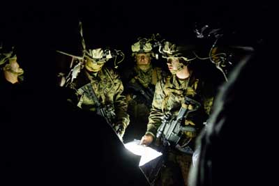 Troops prepare for night raid training in Southeast Asia. Photo courtesy of Nate Eckman.