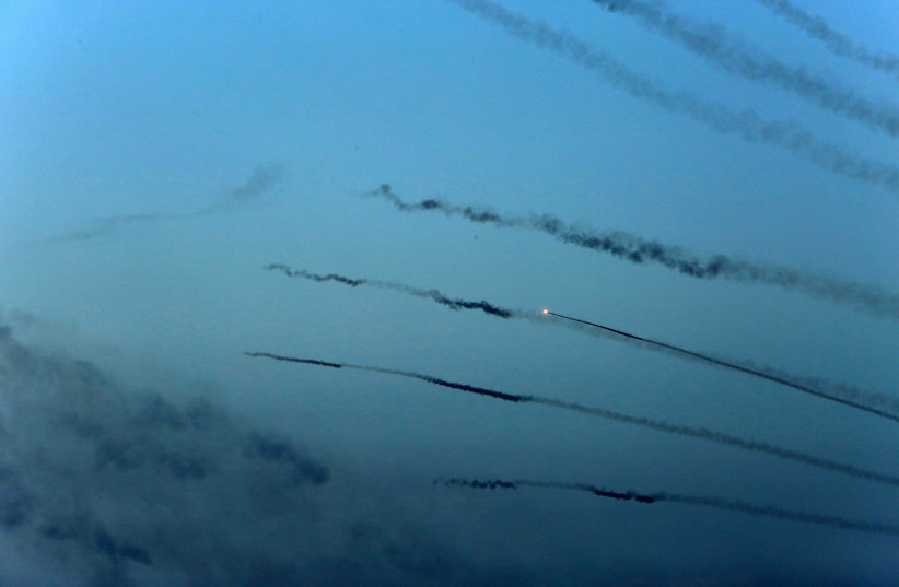 Hamas fires a large number of rockets towards Israel in the city of Rafah in the southern Gaza Strip, October 7, 2023. (credit: ABED RAHIM KHATIB/FLASH90) Hamas fires a large number of rockets towards Israel in the city of Rafah in the southern Gaza Strip, October 7, 2023. (credit: ABED RAHIM KHATIB/FLASH90)