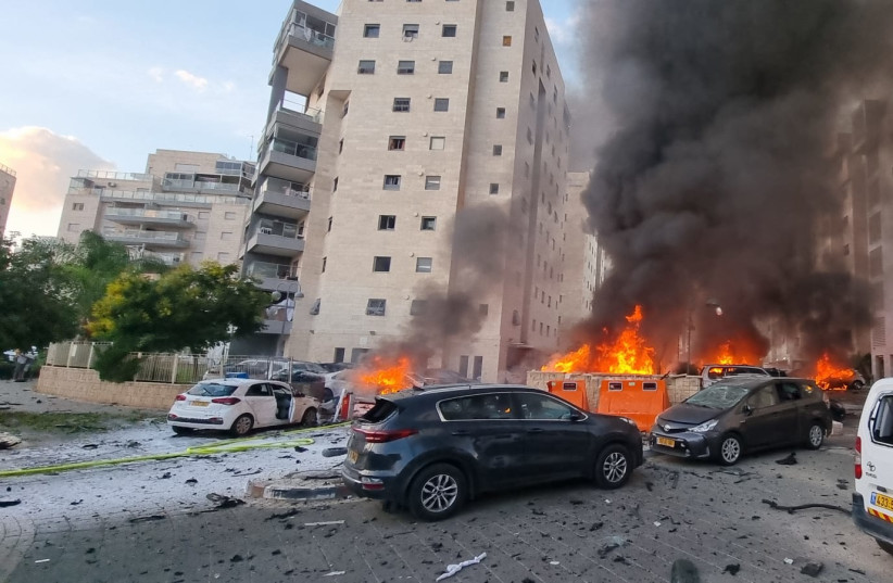 The scene where a rocket fired from Gaza into Southern Israel, hit and caused damaged in the southern Israeli city of Ashkelon. October 7, 2023. (credit: EDI ISRAEL/FLASH90) The scene where a rocket fired from Gaza into Southern Israel, hit and caused damaged in the southern Israeli city of Ashkelon. October 7, 2023. (credit: EDI ISRAEL/FLASH90)