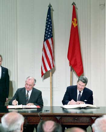President Ronald Reagan and Soviet General Secretary Mikhail Gorbachev signing the INF Treaty in the East Room in December 1987.