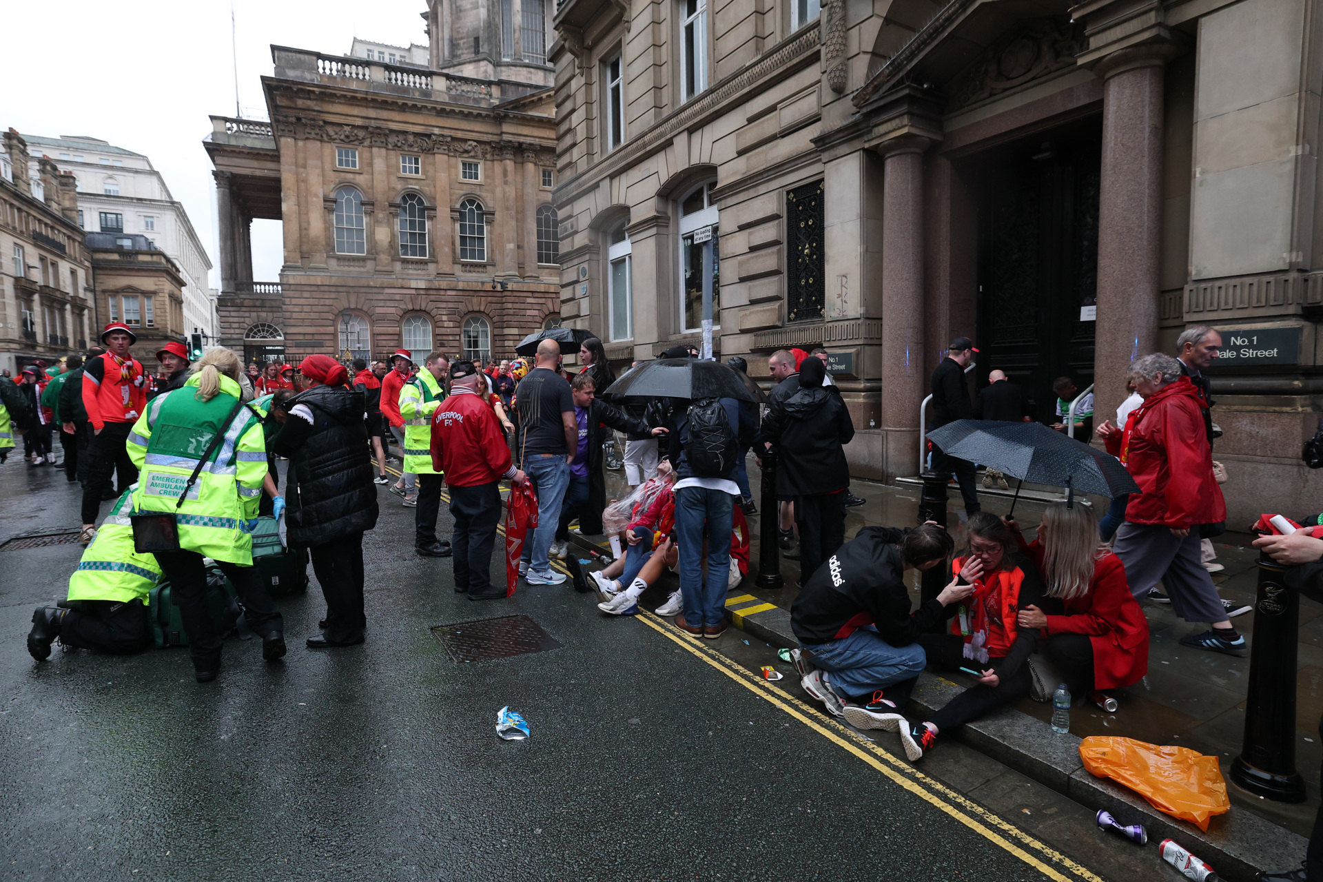 LIVERPOOL, ENGLAND - MAY 26: A large emergency service presence is pictured as members of the public react on Water Street during the Liverpool Trophy Parade on May 26, 2025 in Liverpool, England. (Photo by Getty Images)