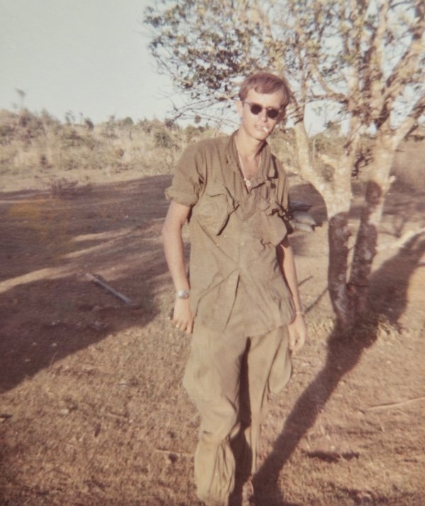 The author taking a smoke break while setting up camp in Vietnam in 1969.