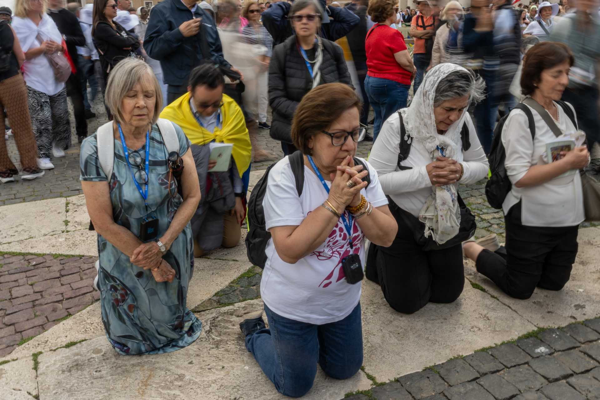 VATICAN CITY, VATICAN - MAY 18: Well-wishers pray during the Inauguration Mass of Pope Leo XIV in St Peter's Square on May 18, 2025 in Vatican City, Vatican. Pope Leo XIV (formerly Cardinal Robert Francis Prevost) presided over his inauguration mass in St Peter's Square after his election on May 8th. (Photo by David Ramos/Getty Images)
