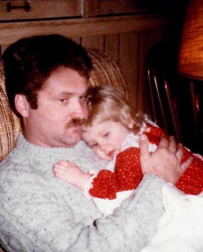 The writer, at age 2, with her father, Roger Madden. When she was sad, she only wanted her father.
